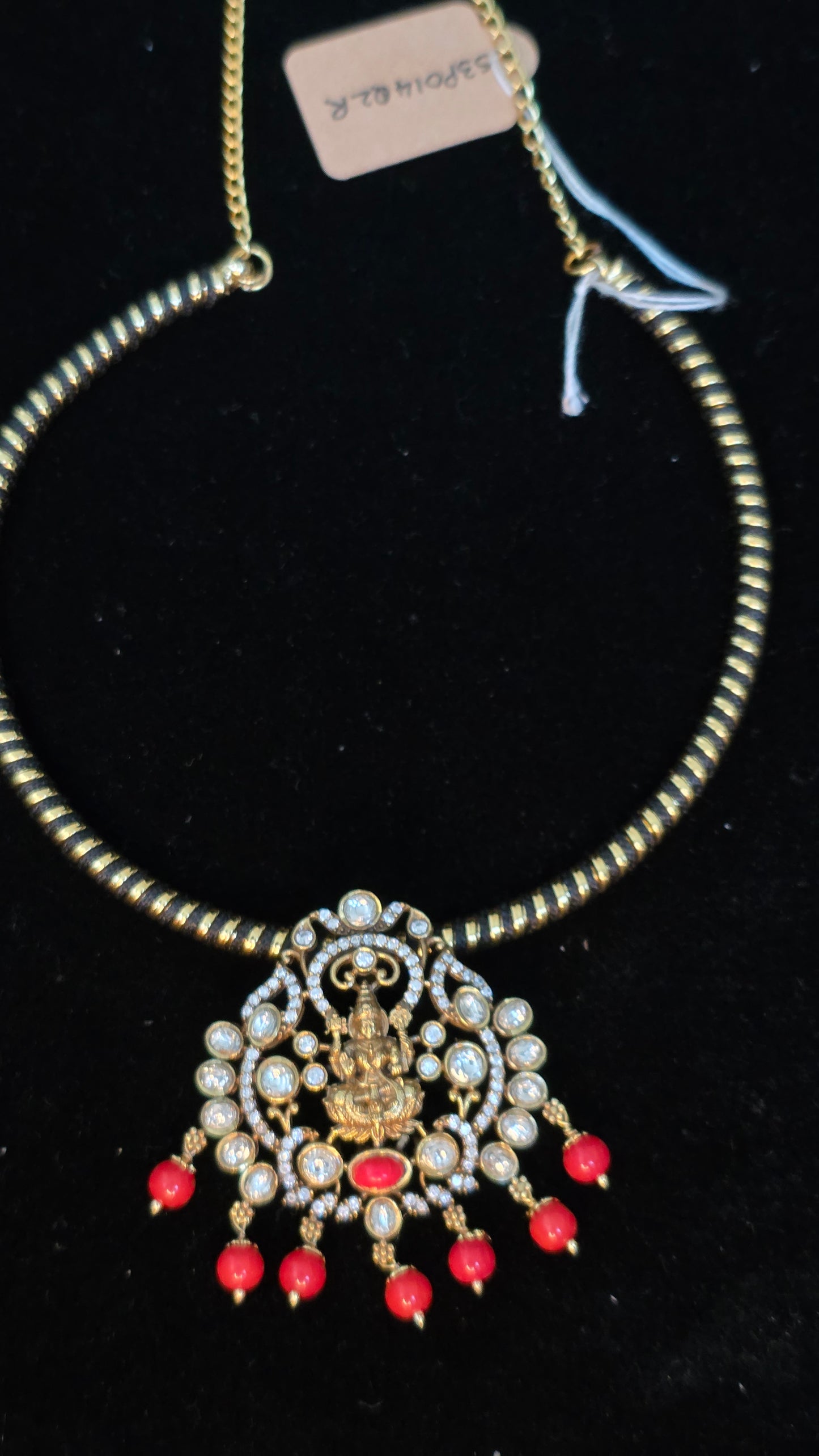 Black hasli with laxmi pendent with coral beads