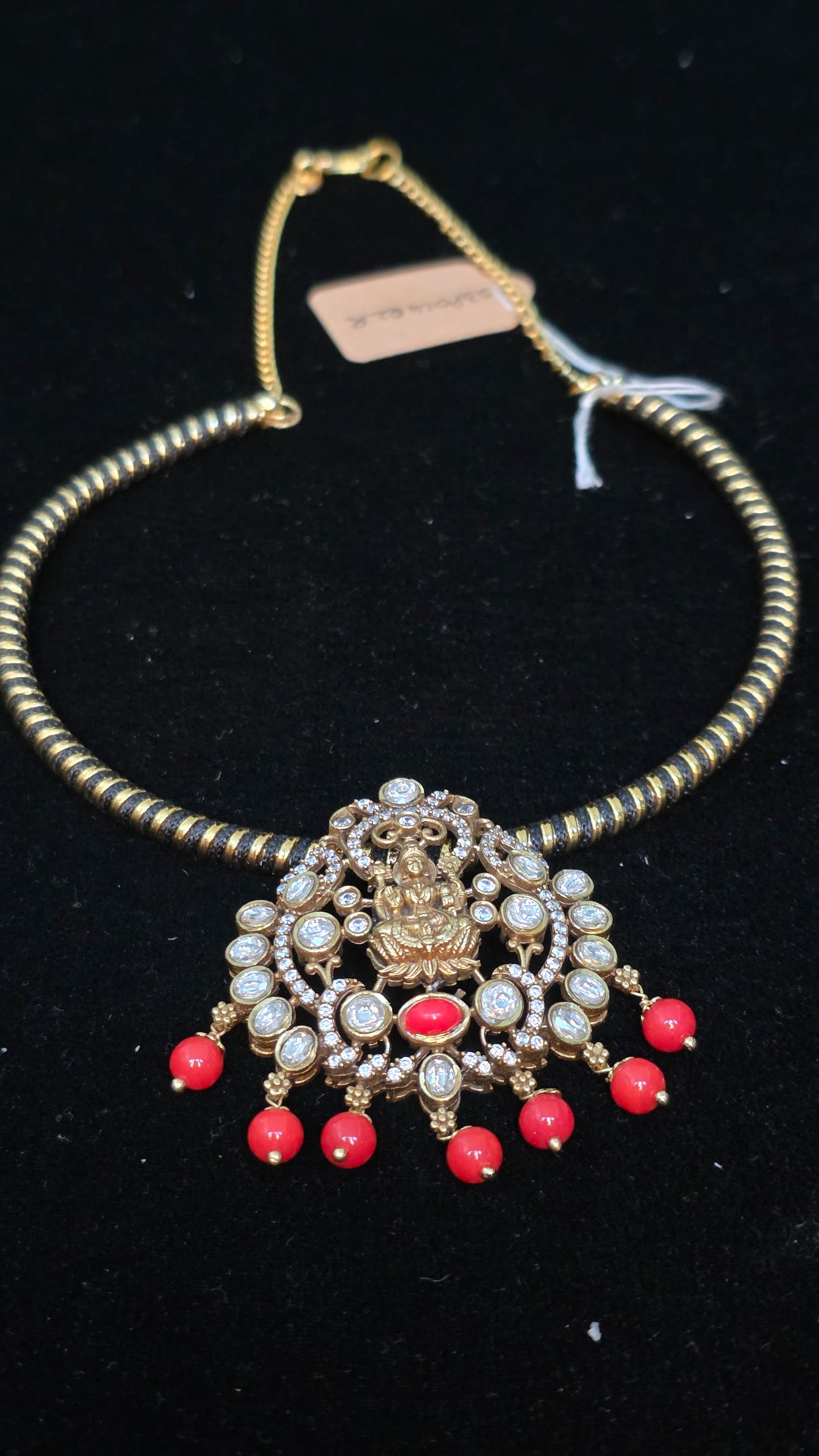 Black hasli with laxmi pendent with coral beads